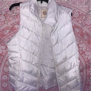 size large, white zip up vest